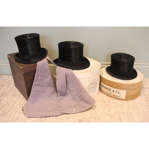 348 - An early 20th century Gentleman's silk top hat by F.W. Knowles of Chester, approximately 56cm intern... 