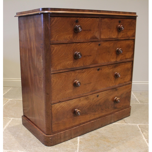 826 - A Victorian mahogany chest of drawers, the rectangular top with rounded front corners over two short... 