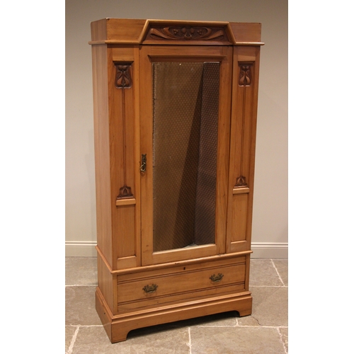 835 - An Art Nouveau satin walnut single wardrobe, early 20th century, the integral cornice with moulded l... 