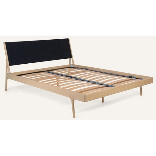 849 - A Heals Gazzda fawn super king bed, in light oak, with a black fabric headboard, slatted bed base up... 