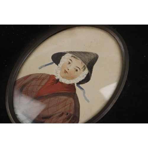 234 - Welsh school (early 19th century),  
An oval half length portrait of a young girl in traditional dre... 