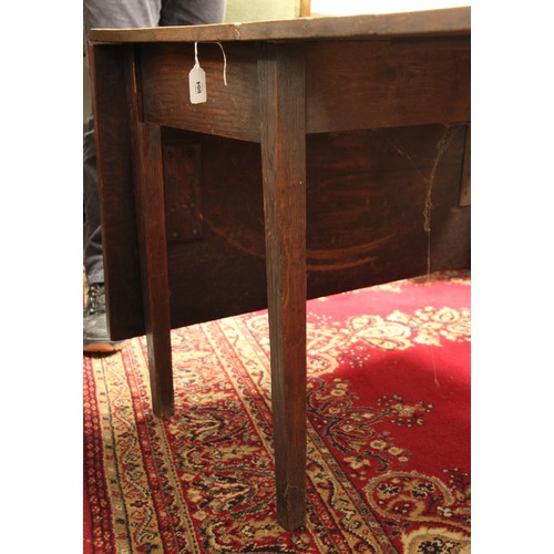 804 - A 19th century oak drop leaf table, the rectangular top upon legs of tapering square section, 70cm H... 