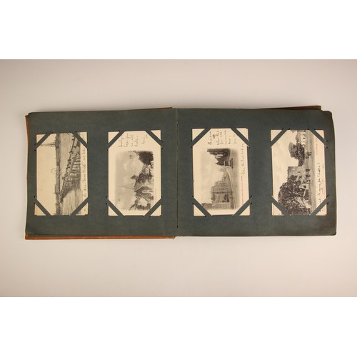 484 - A selection of five Victorian photograph and postcard albums, 19th century and later, comprising: a ... 