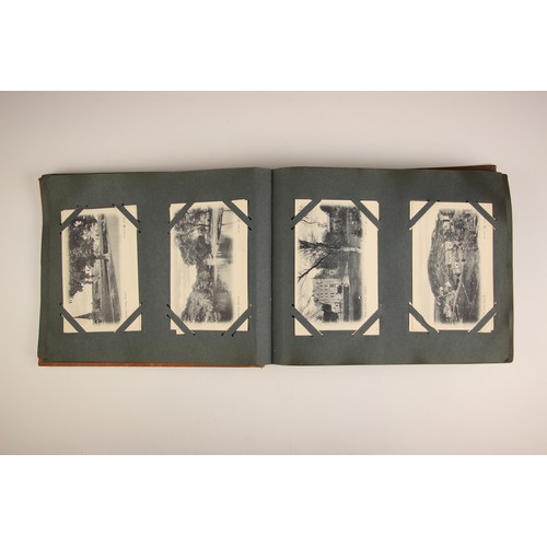 484 - A selection of five Victorian photograph and postcard albums, 19th century and later, comprising: a ... 