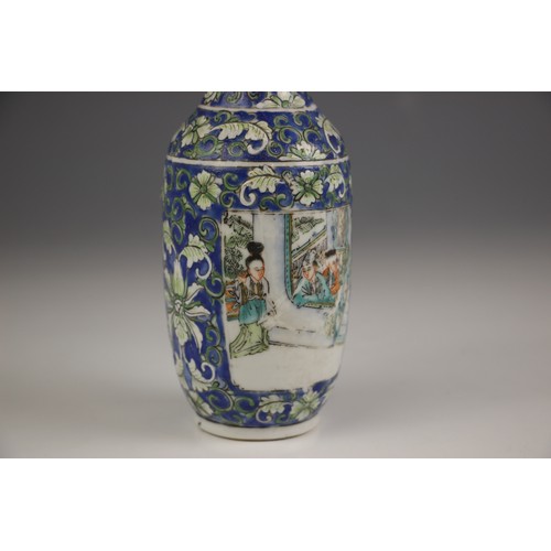 573 - A Chinese porcelain rouleau vase, 19th century, decorated with floral sprays against a blue ground a... 