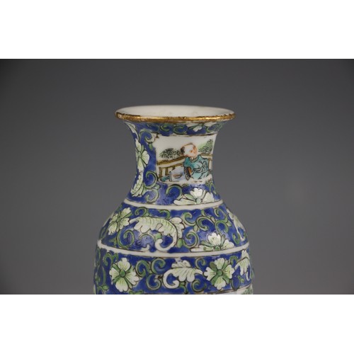 573 - A Chinese porcelain rouleau vase, 19th century, decorated with floral sprays against a blue ground a... 