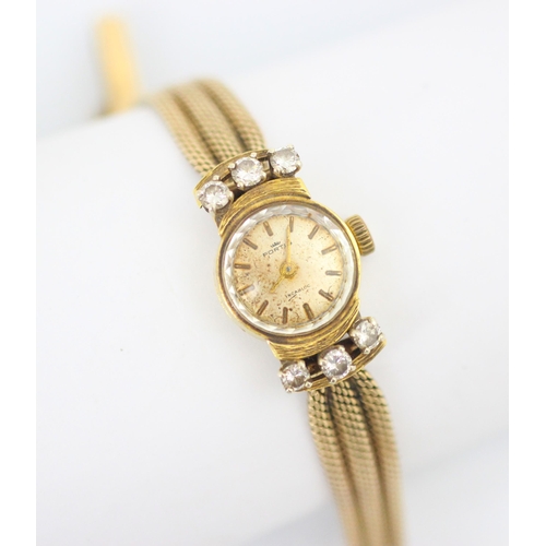 124 - A Fortis ladies yellow gold and diamond set dress watch, the circular dial with baton markers, set t... 