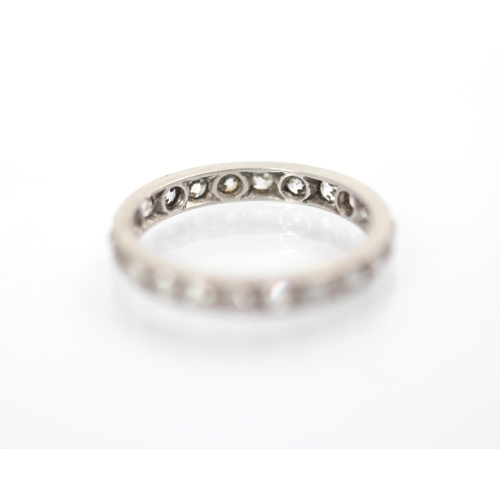 152 - An early 20th century diamond full eternity ring, the twenty two mixed cut diamonds set in white met... 