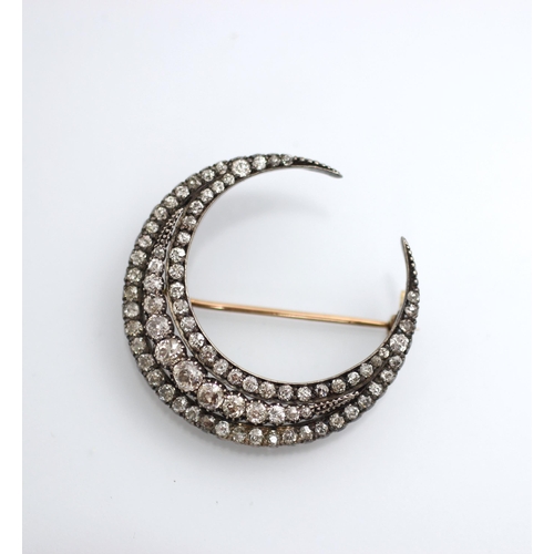 159 - A 19th century diamond crescent brooch, possibly by Wartski, the triple crescent brooch set with gra... 