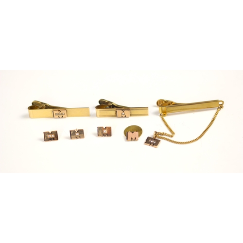 171 - A selection of yellow metal and gold coloured jewellery, including three diamond set 'M' dress studs... 