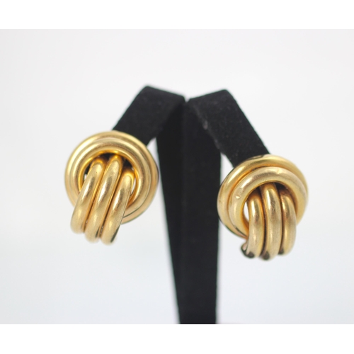 176 - A pair of 9ct yellow gold earrings, the hollow raised double circular link with triple strand detail... 