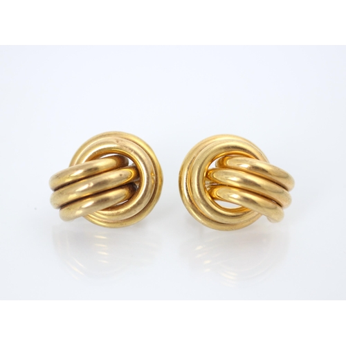 176 - A pair of 9ct yellow gold earrings, the hollow raised double circular link with triple strand detail... 