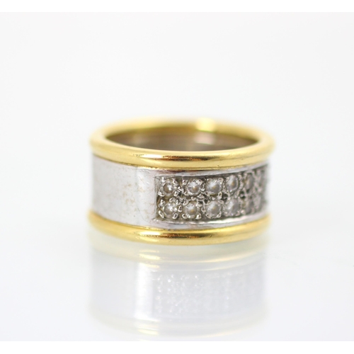 222 - An 18ct two tone diamond set ring, the white and yellow gold band ring set with double row of twenty... 