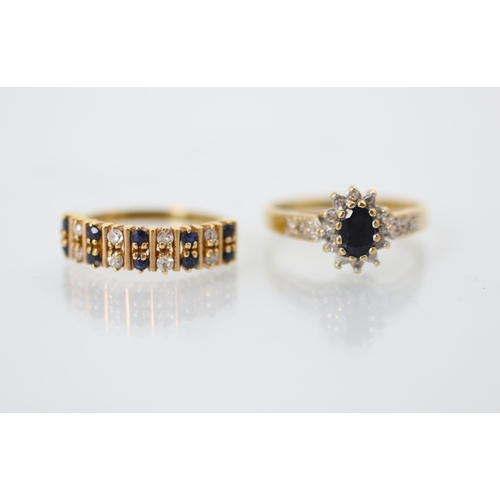 231 - A diamond and untested sapphire double row ring, the eight round cut diamonds interspersed with ten ... 