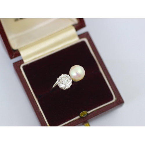 246 - A mid 20th century diamond and untested pearl ‘toi et moi’ the transitional diamond set in white met... 