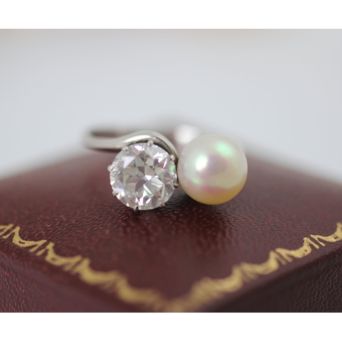 246 - A mid 20th century diamond and untested pearl ‘toi et moi’ the transitional diamond set in white met... 