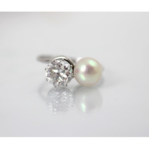 246 - A mid 20th century diamond and untested pearl ‘toi et moi’ the transitional diamond set in white met... 