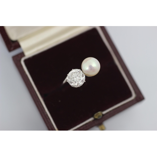 246 - A mid 20th century diamond and untested pearl ‘toi et moi’ the transitional diamond set in white met... 