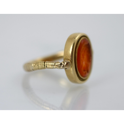 253 - An 18th century intaglio ring, the oval intaglio depicting a Roman Emperor, in profile, facing dexte... 