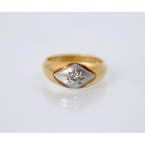 273 - A yellow metal diamond gypsy ring, the round cut diamond set within white metal lozenge shaped detai... 