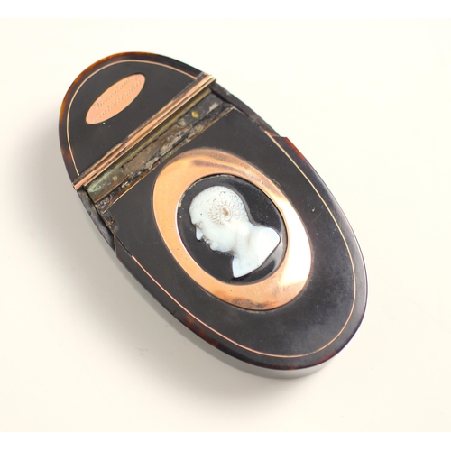 276 - A 19th century tortoiseshell and gold mounted snuff box, the oval box with half hinged cover inlayed... 