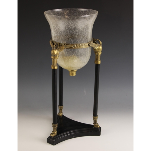 468 - A modern Neoclassical style storm lantern, the tri-form base supporting three brass mounted columns,... 