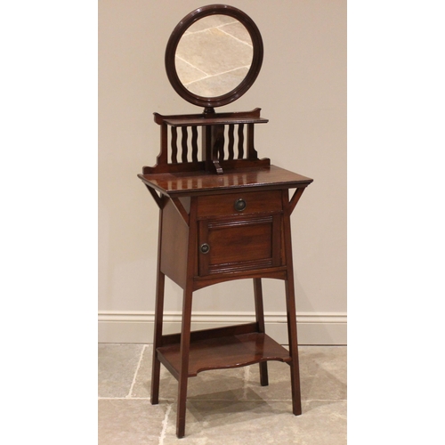 812 - An Arts and Crafts walnut shaving stand, early 20th century, the adjustable circular mirror, over a ... 