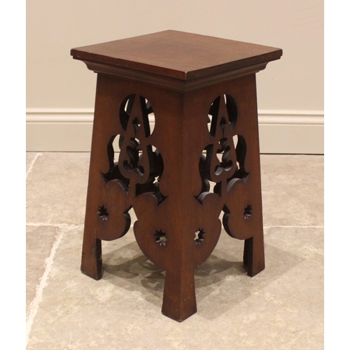 813 - An Arts and Crafts mahogany plant stand, early 20th century, the square top upon four sides each car... 