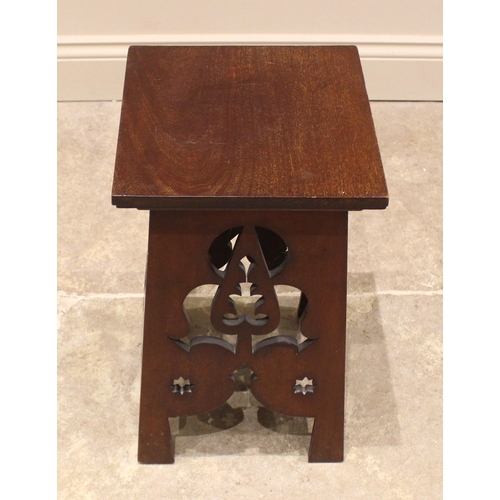 813 - An Arts and Crafts mahogany plant stand, early 20th century, the square top upon four sides each car... 