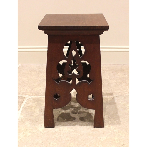 813 - An Arts and Crafts mahogany plant stand, early 20th century, the square top upon four sides each car... 