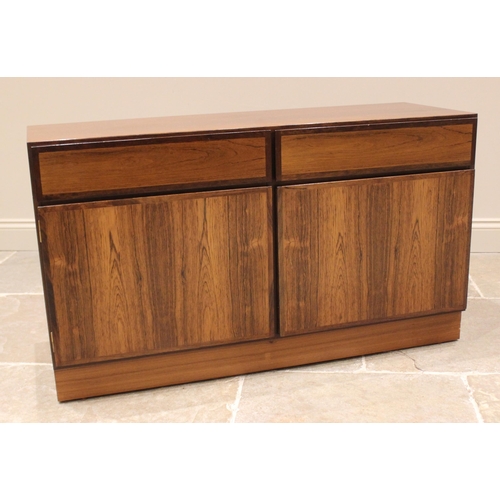 830 - A Classic rosewood veneered sideboard, probably Indian rosewood, mid to late 20th century, formed wi... 