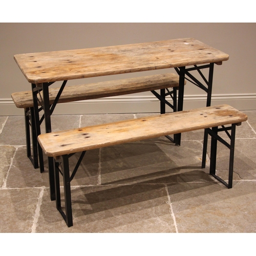 844 - A rustic folding patio set, late 20th century, comprising a pine slab top table upon folding angle i... 