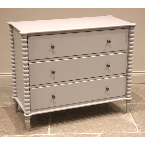 846 - A John Lewis painted bobbin chest of drawers, early 21st century, the three long drawers housed by p... 