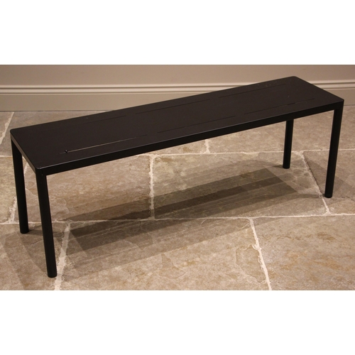 853 - A contemporary powder coated bench, probably Case, the rectangular top upon tubular supports, 45cm H... 