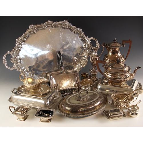 103 - A large selection of silver plated items, to include a large twin handled tray, stamped 'JM Trotter'... 