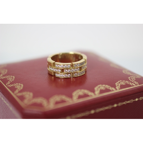 135 - A Cartier Maillon Panthere diamond set ring, the thirty five round cut diamonds set within yellow go... 