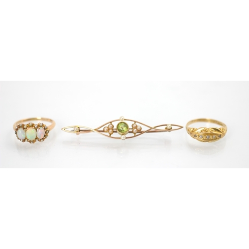 137 - A selection of jewellery, to include an early 20th century opal and seed pearl ring, the three oval ... 