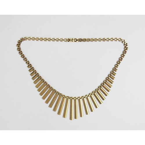 211 - A 9ct yellow gold fringe necklace, the graduated fringe upon gate link chain, with box and tongue fa... 