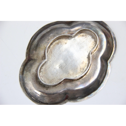 28 - A set of six white metal pin dishes, of quatrefoil shape, each with character marks to base, 7.5cm w... 