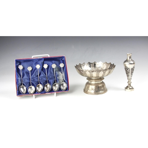 67 - A cased set of six teaspoons, stamped 'Silver' to reverse of terminal, each with shaped terminal and... 