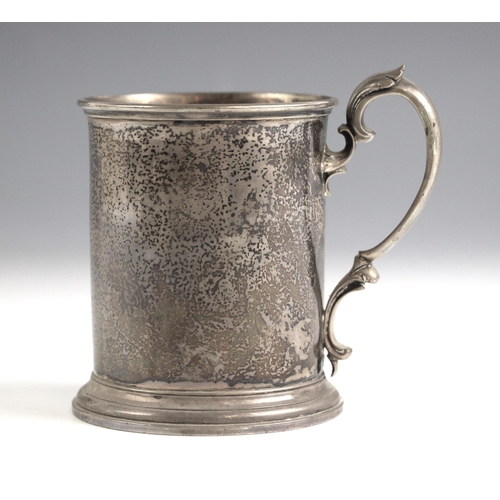 70 - A Victorian silver mug, George Ivory, London 1856, the acanthus capped handle above plain cylindrica... 