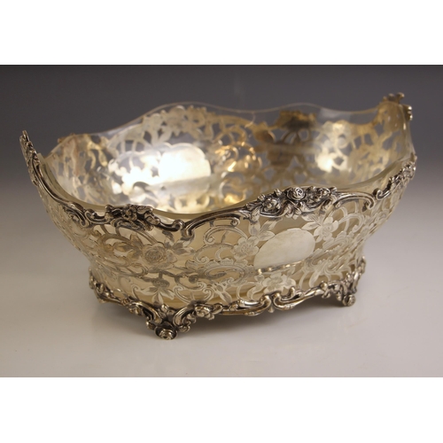 82 - A Victorian silver rose bowl,	Carrington and Co, London 1900, the shaped rim with cast rose detail a... 