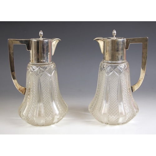 92 - A pair of George V silver mounted decanters, Clark and Sewell, Chester 1919, the hinged cover with s... 