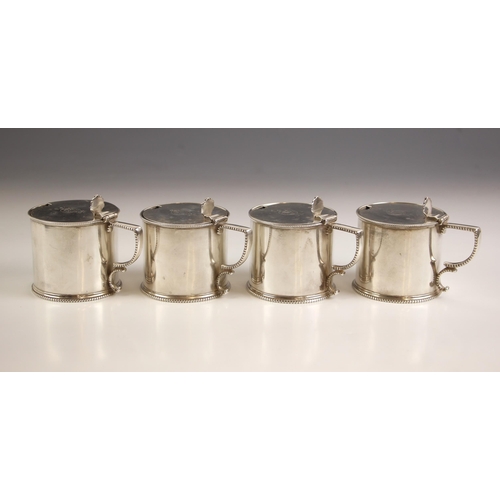 98 - MILITARY INTEREST: A set of four Victorian silver drum shaped mustards, George Richards Elkington, L... 