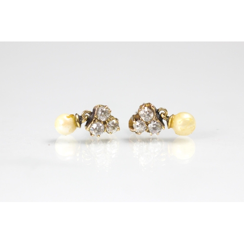 131 - A pair of diamond and cultured pearl earrings, the three old cut diamonds in a trefoil design suspen... 