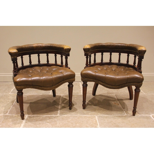 807 - A pair of Victorian style mahogany and olive brown leather desk / library chairs, each with a curved... 