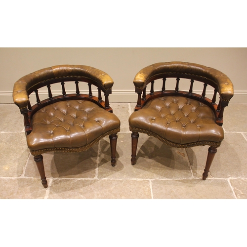 807 - A pair of Victorian style mahogany and olive brown leather desk / library chairs, each with a curved... 