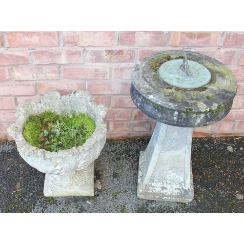 871 - A reconstituted stone sun dial, with a pyramidal shaped pedestal, drum shaped top with applied brass... 