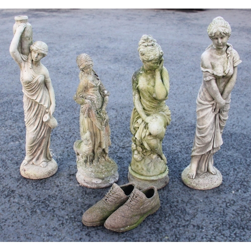 876 - Four reconstituted stone garden ornaments, each modelled as a female classical figure, from 60cm to ... 