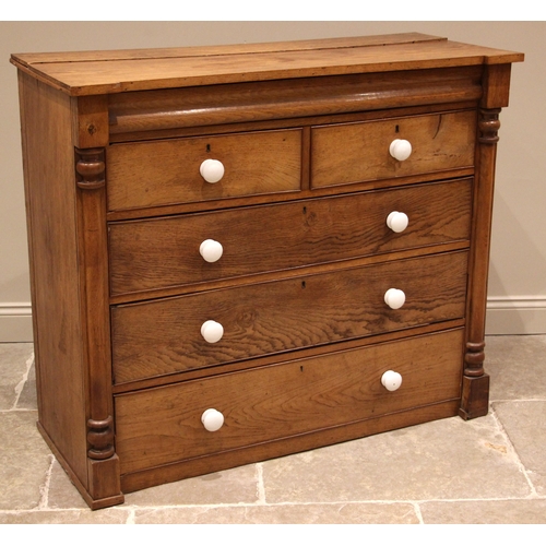 809A - A Victorian golden oak Scottish chest of drawers, formed with a full width frieze drawer over an arr... 